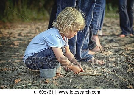 St. Catharines, Ontario, Canada; A Child Playing In The Sand View Large Photo Image Stock Image - St. Catharines, Ontario, Canada; A Child Playing In The Sand. Fotosearch