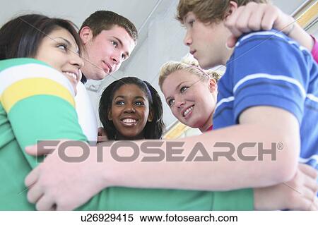 Stock Photography - teenagers bonding in a group. Fotosearch