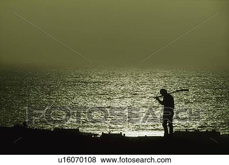 Stock Photo - Traditional Turf Cutting, Ireland. Fotosearch