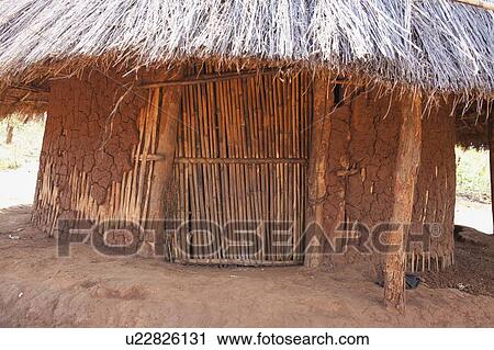 Stock Image - typical dwelling or house in a rural area; manica, mozambique, africa. Fotosearch