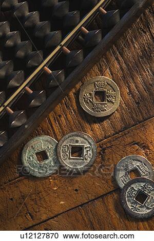 Abacus and Chinese currency View Large Photo Image Stock Image - Abacus and Chinese currency. Fotosearch