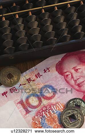 Abacus and Chinese currency View Large Photo Image Stock Image - Abacus and Chinese currency. Fotosearch