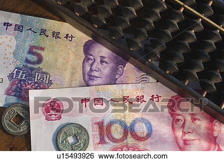 Abacus and Chinese currency View Large Photo Image Stock Photograph - Abacus and Chinese currency. Fotosearch