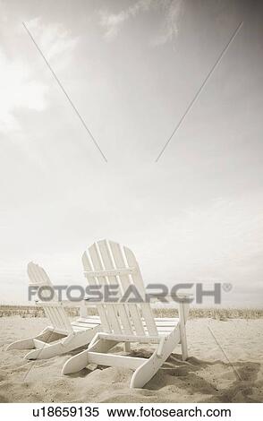 Adirondack chairs on the beach View Large Photo Image Stock Photography - Adirondack chairs on the beach. Fotosearch