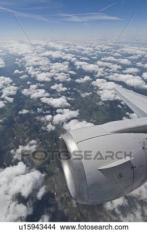 Picture - Airplane in sky. Fotosearch