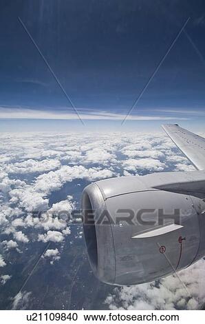 Airplane in sky View Large Photo Image Stock Image - Airplane in sky. Fotosearch