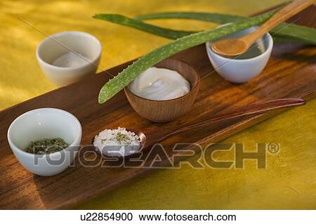 Aloe Vera dried herbs lotion and salt on wooden tray View Large Photo Image Stock Image - Aloe Vera dried herbs lotion and salt on wooden tray. Fotosearch