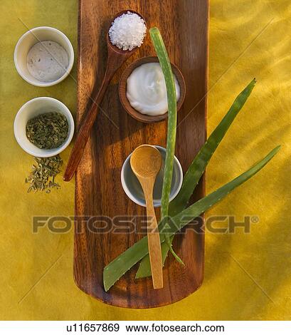 Aloe Vera dried herbs lotion and salt on wooden tray View Large Photo Image Stock Photo - Aloe Vera dried herbs lotion and salt on wooden tray. Fotosearch
