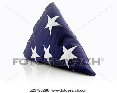 Stock Photograph - American flag folded in a triangle. Fotosearch