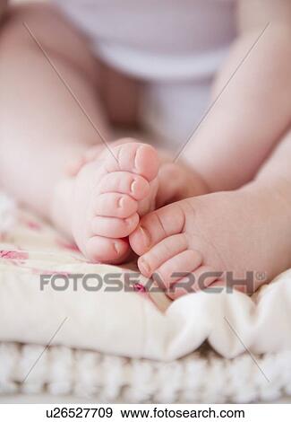 Baby's feet View Large Photo Image Stock Photo - Baby's feet. Fotosearch