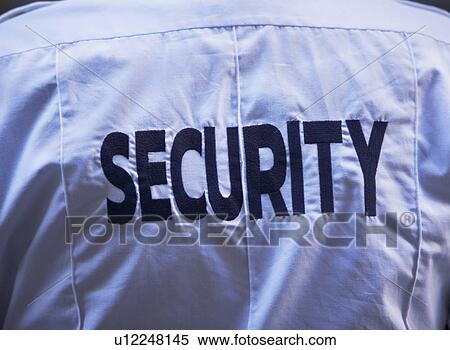 Back of security guard`s shirt View Large Photo Image Stock Photography - Back of security guard`s shirt. Fotosearch
