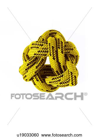 Stock Image - Ball of yellow rope. Fotosearch