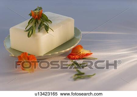 Bar of soap and gladiola petals View Large Photo Image Stock Photography - Bar of soap and gladiola petals. Fotosearch