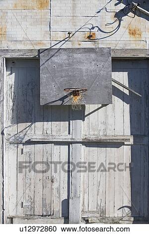 Basketball net on rustic building View Large Photo Image Stock Image - Basketball net on rustic building. Fotosearch
