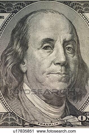 Stock Image - Benjamin Franklin on one hundred dollar bill. Fotosearch