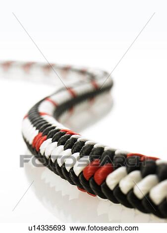 Stock Image - Black red and white rope. Fotosearch