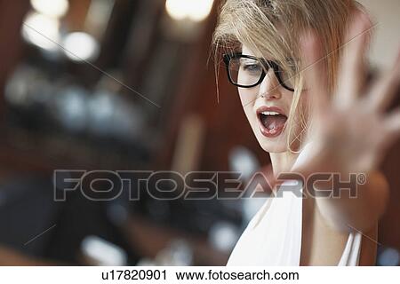 Blond woman shouting View Large Photo Image Stock Image - Blond woman shouting. Fotosearch