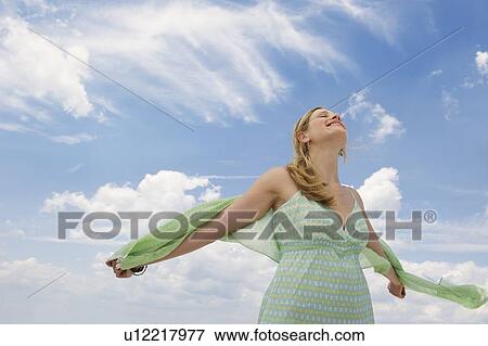 Blond woman walking outside View Large Photo Image Stock Photo - Blond woman walking outside. Fotosearch