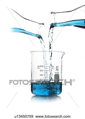 Blue liquid being poured into measuring cup View Large Photo Image Stock Photo - Blue liquid being poured into measuring cup. Fotosearch