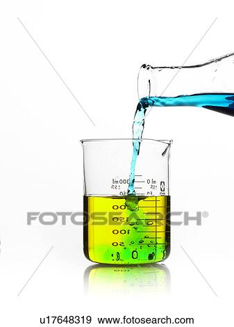 Blue liquid being poured into measuring cup View Large Photo Image Stock Photo - Blue liquid being poured into measuring cup. Fotosearch