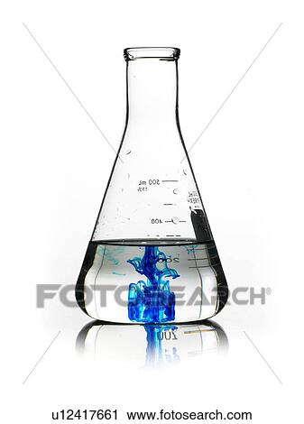 Stock Image - Blue liquid in beaker. Fotosearch