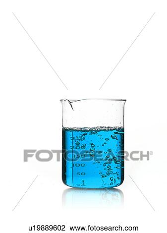 Stock Image - Blue liquid in measuring cup. Fotosearch