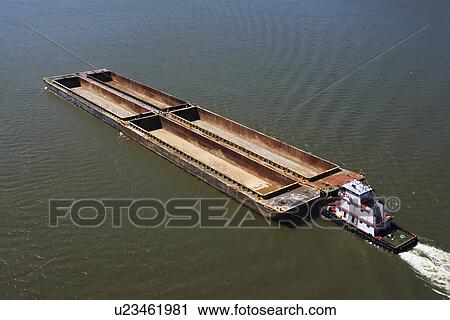 Boat and barges in river View Large Photo Image Stock Image - Boat and barges in river. Fotosearch