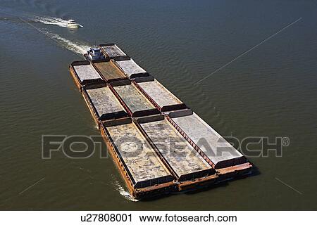 Boat and barges in river View Large Photo Image Stock Image - Boat and barges in river. Fotosearch