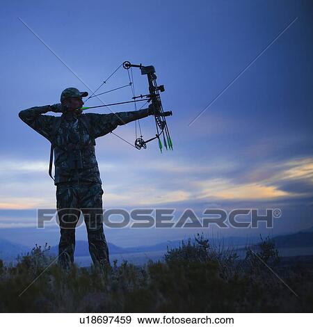 Bow and arrow hunter View Large Photo Image Stock Photo - Bow and arrow hunter. Fotosearch