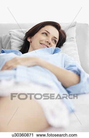 Brunette woman resting View Large Photo Image Stock Image - Brunette woman resting. Fotosearch
