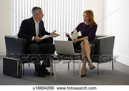 Stock Photograph - Business meeting. Fotosearch