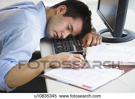 Businessman Asleep At His Desk Stock Photography U10835345