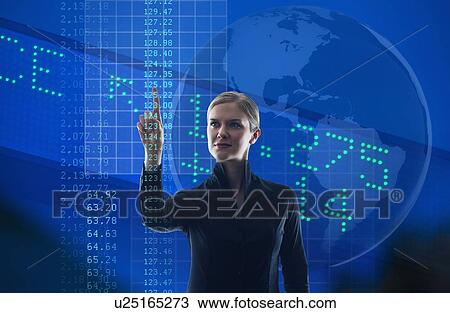 Stock Image - Businesswoman looking at numbers on screen. Fotosearch