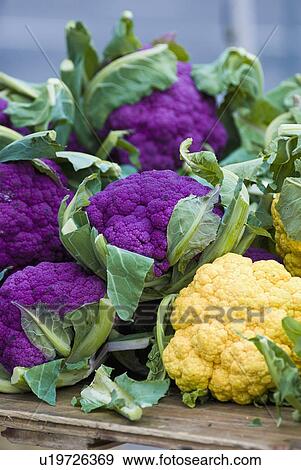 Stock Photo - Cauliflower on display at farmer's market. Fotosearch