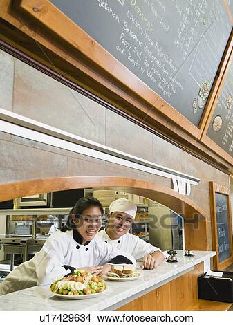 Picture - Chefs in restaurant. Fotosearch