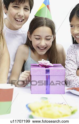 Children at a birthday celebration View Large Photo Image Stock Photo - Children at a birthday celebration. Fotosearch