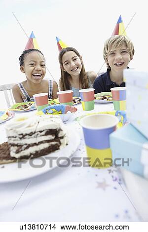 Children at a birthday party View Large Photo Image Picture - Children at a birthday party. Fotosearch