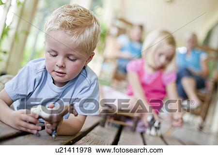 Children playing on porch View Large Photo Image Stock Photo - Children playing on porch. Fotosearch