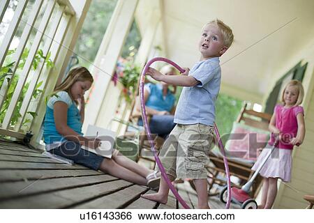 Children playing on porch View Large Photo Image Stock Photograph - Children playing on porch. Fotosearch