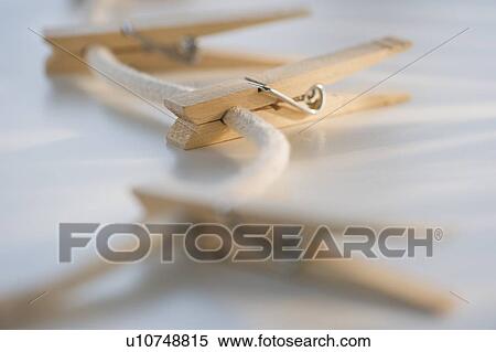 Clothespins on clothesline View Large Photo Image Stock Photography - Clothespins on clothesline. Fotosearch