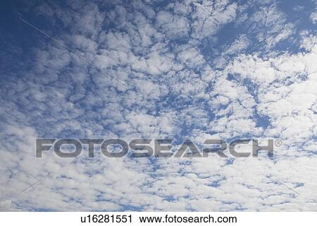 Stock Image - Clouds and blue sky. Fotosearch
