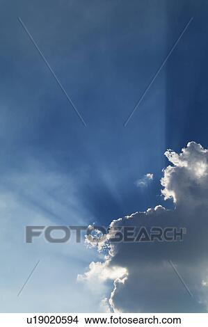 Clouds and light beam View Large Photo Image Picture - Clouds and light beam. Fotosearch