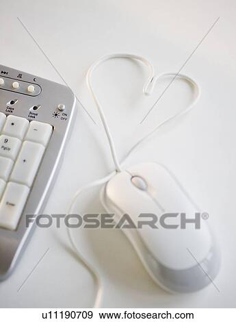 Computer mouse wire in shape of heart View Large Photo Image Stock Photo - Computer mouse wire in shape of heart. Fotosearch