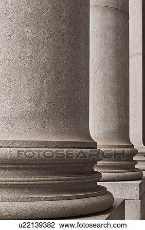 Stock Image - Concrete columns on building. Fotosearch