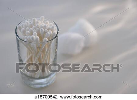 Stock Image - Cotton swabs in glass. Fotosearch