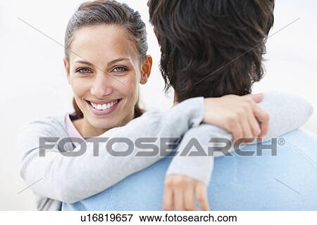 Stock Photo - Couple embracing. Fotosearch
