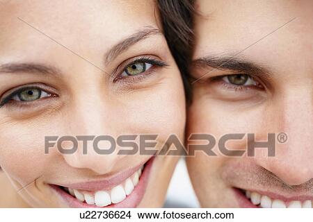 Picture - Cropped picture of a smiling couple. Fotosearch