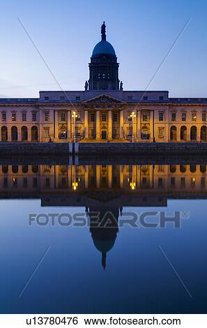 Stock Photograph - Custom House reflecting into River Liffey. Fotosearch