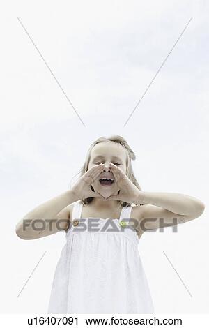 Stock Image - Cute girl shouting. Fotosearch