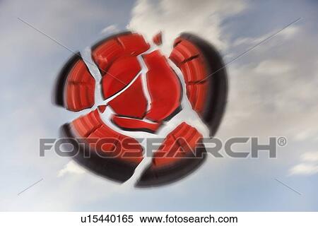 Stock Photography - Exploding skeet shoot target. Fotosearch